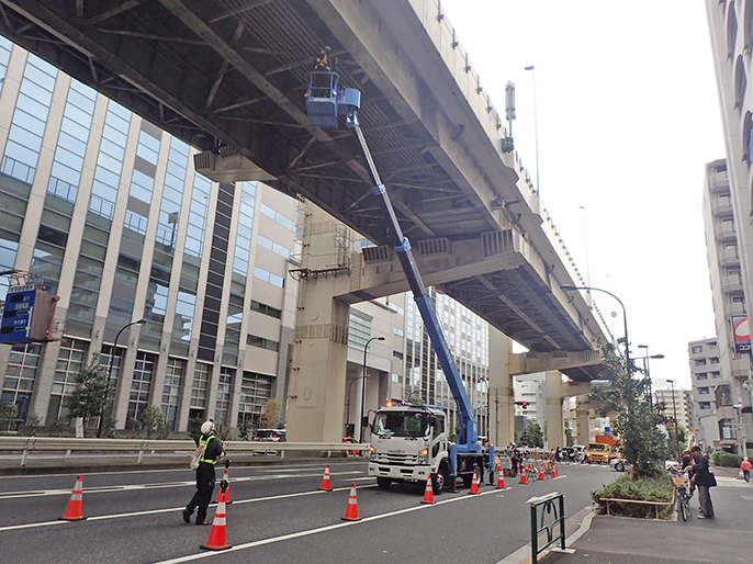 Close inspection of overhead structures using aerial work platform